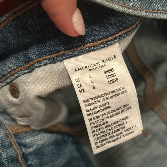 Blue jeans with one rip on the knee- American eagle. Size 4 Short. Bootcut - Picture 3 of 4
